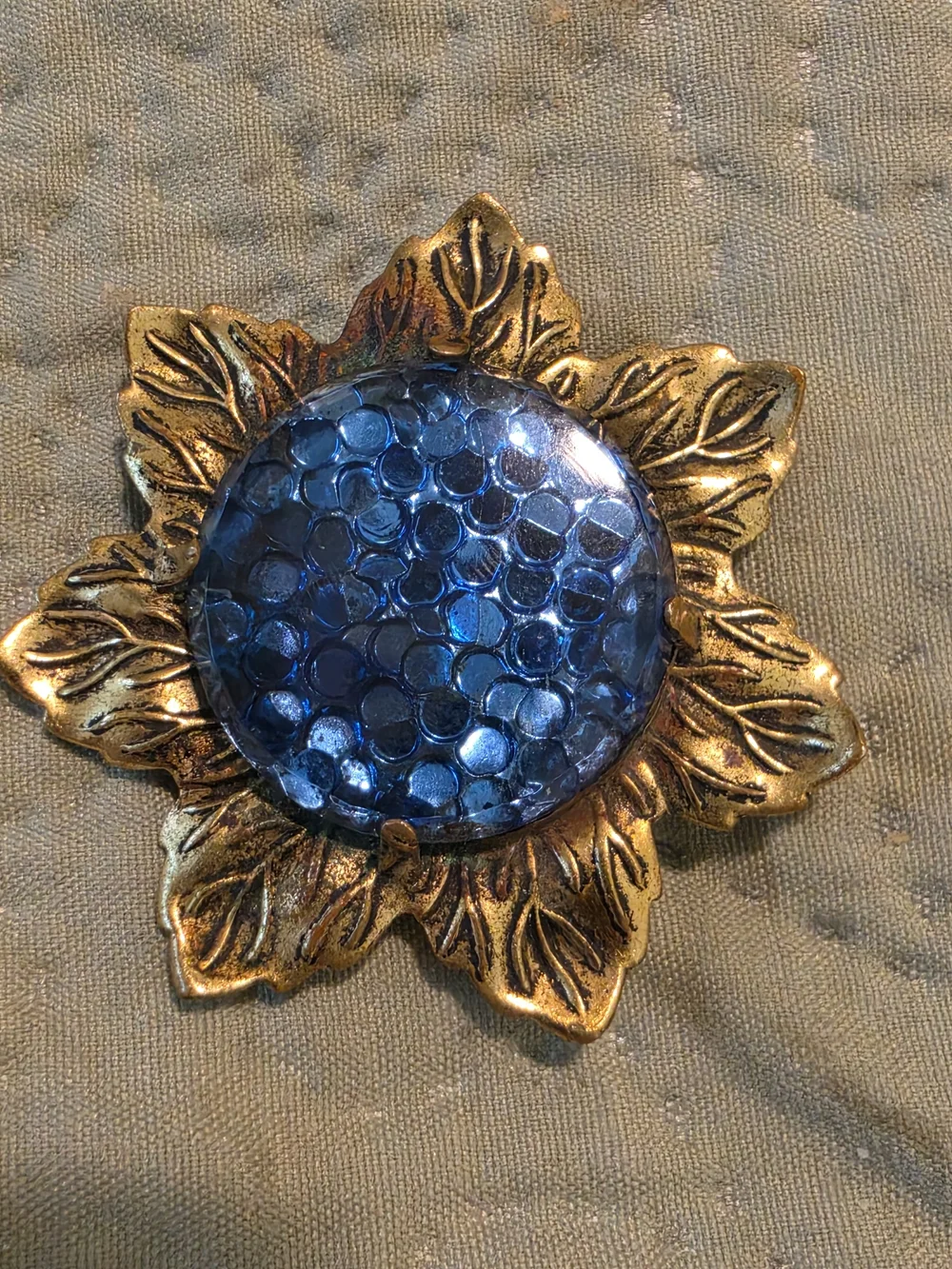 Vintage Gold Sunflower Brooch with Blue Glass Center
